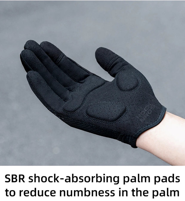 Black glove with SBR shock-absorbing palm pads on a gray background