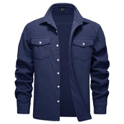 Navy blue shirt with button details on a white background