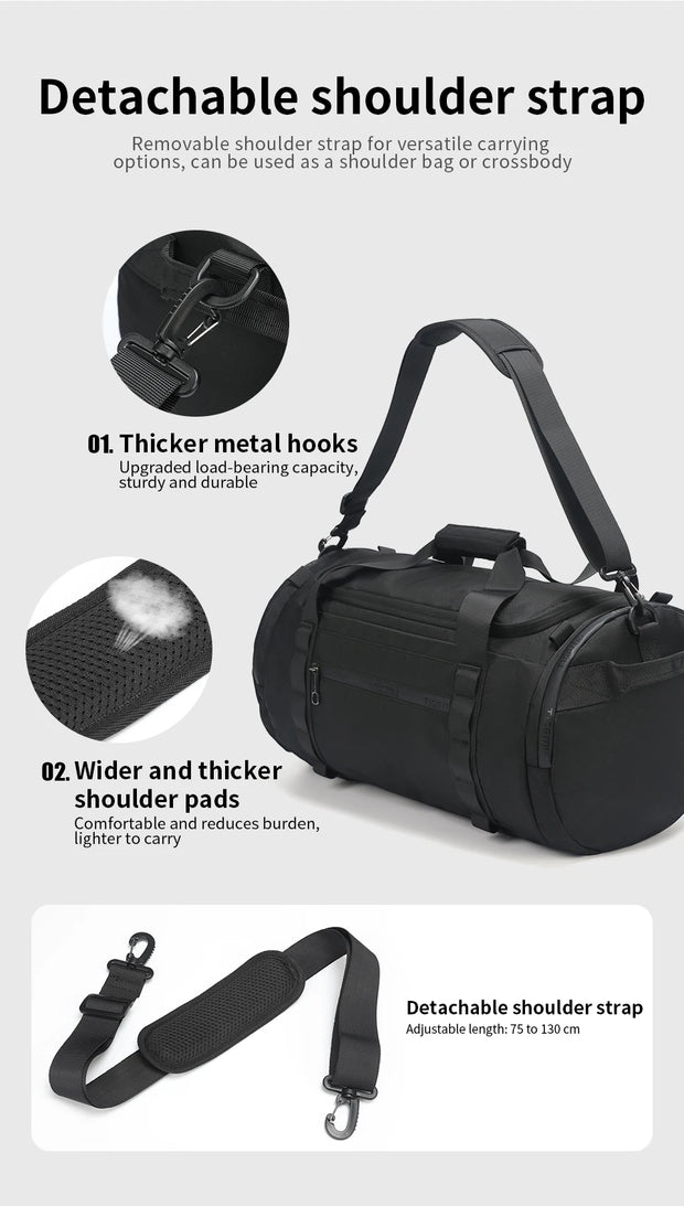 Black duffel bag with detachable shoulder strap on a white background