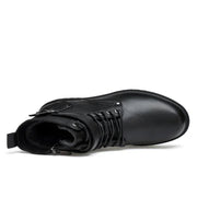 Black leather boot with a zipper on a white background