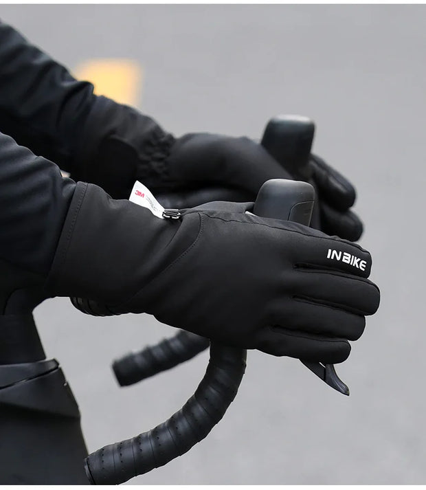 Person wearing black gloves on a blurred background