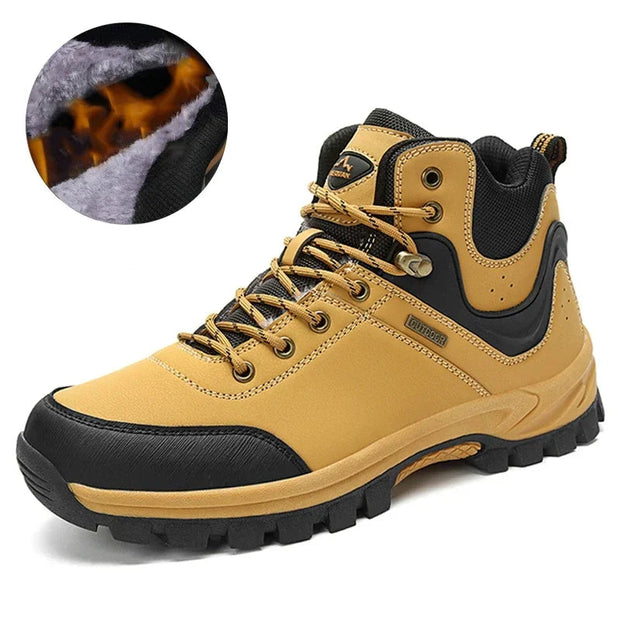 Yellow hiking boot with black accents and fur lining detail on a white background