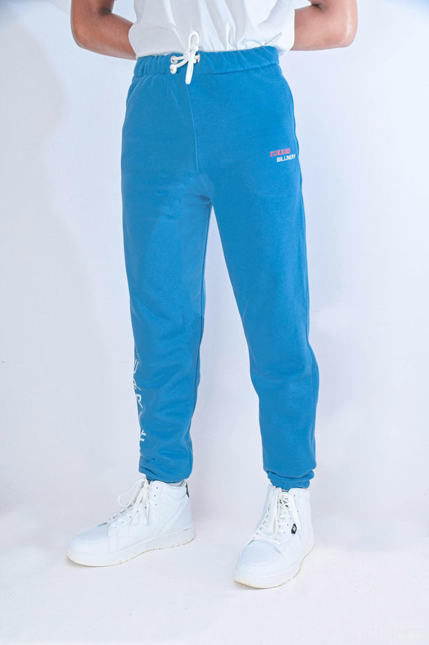 Blue sweatpants with a logo on a white background